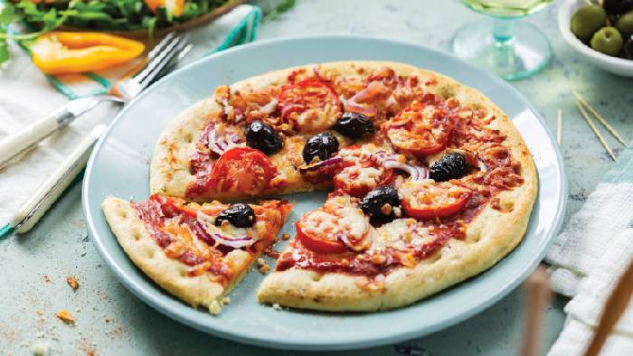 Pizza with salami and olives